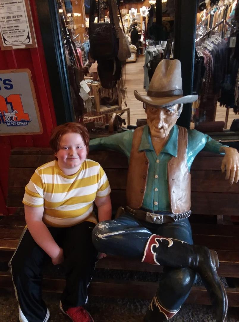 This cowboy, frozen in time since 1883, took as shine to Isaac James at Wall Drug.