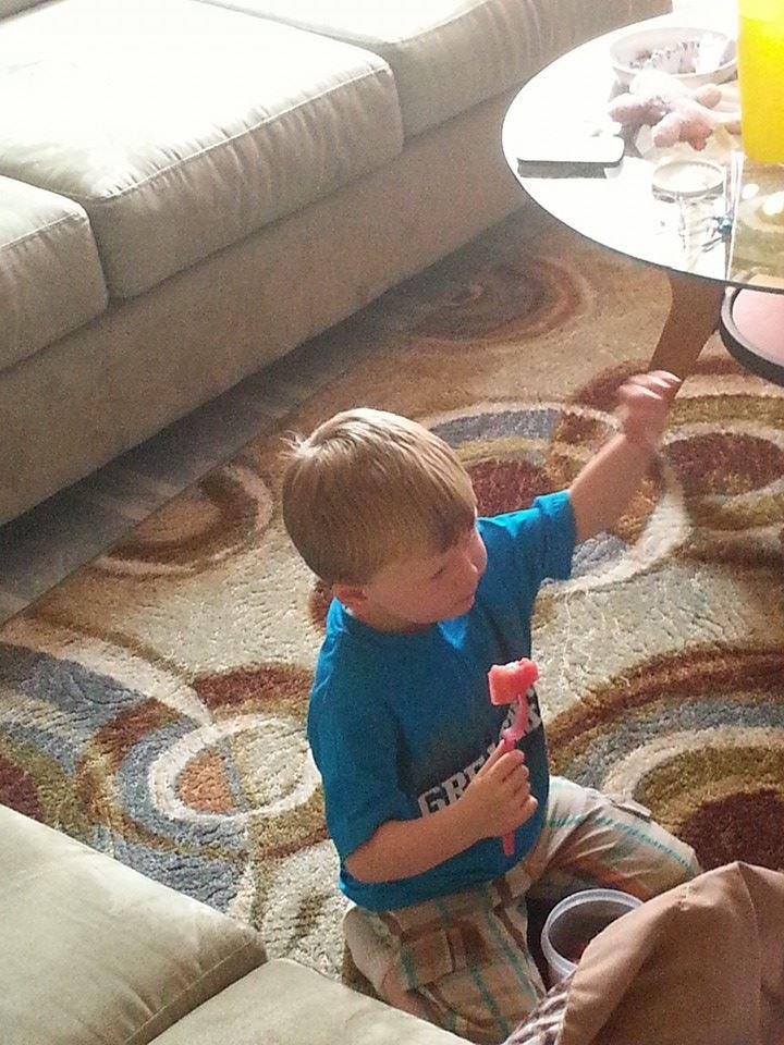 Kaiden into the cartoon he is watching