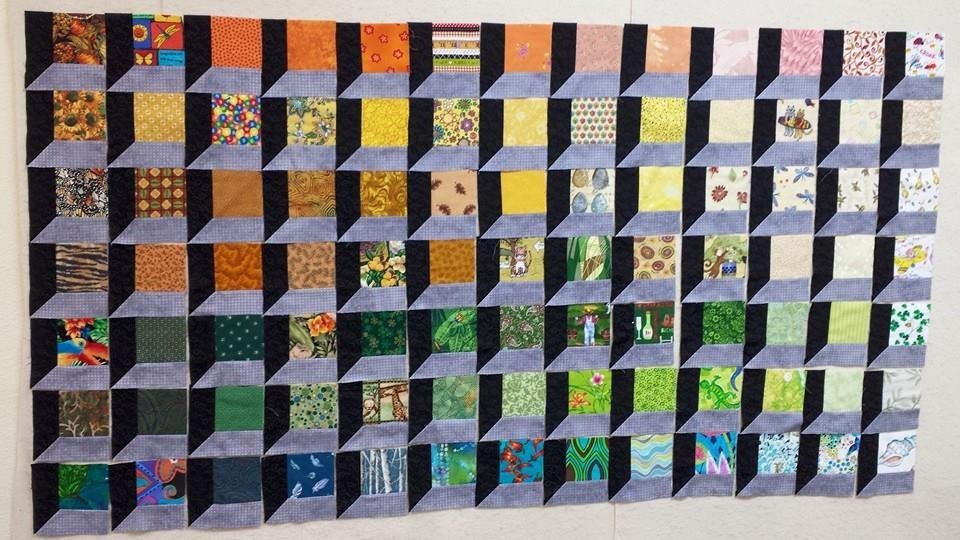 Had great time at quilting retreat with CBQNG members in Rockport this weekend. This is my newest partially done project...windows into my fabric stash.