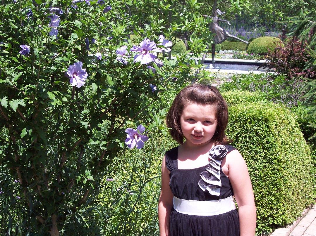 Lily at Kaufman Gardens after visiting the Nelson-Atkins Museum of Art with Grandpa.
