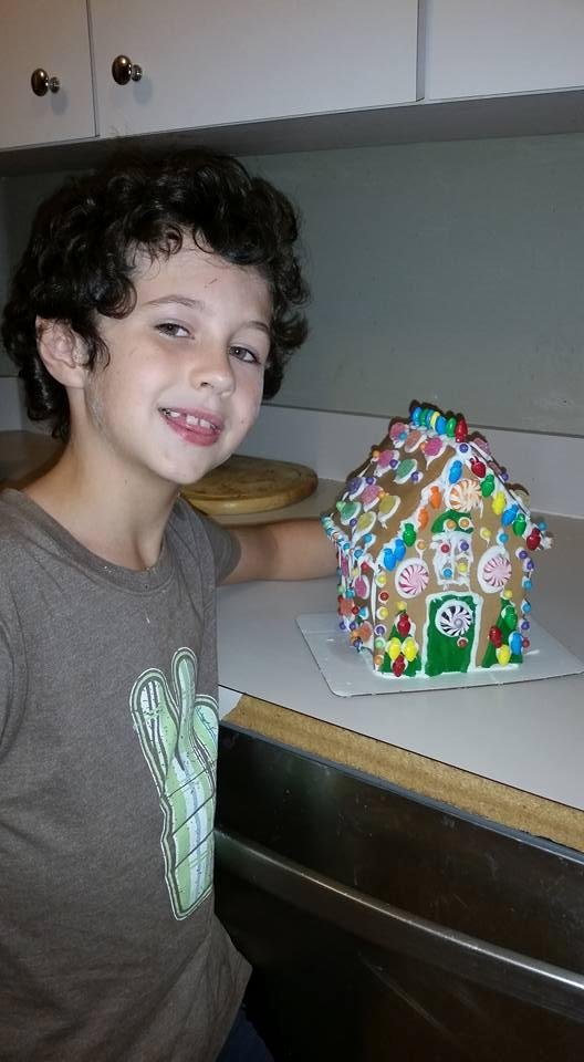 Fun with Jagger decorating a gingerbread house.