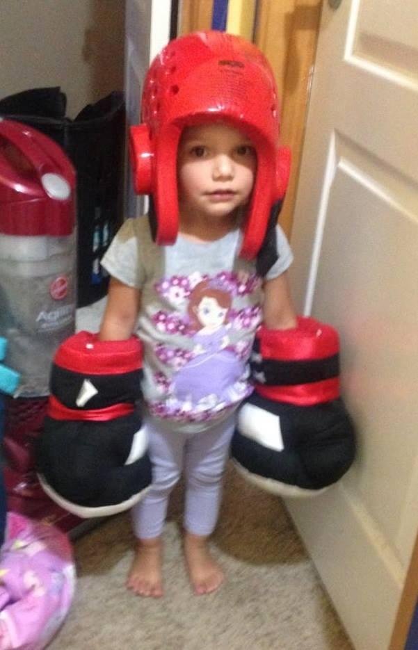 My grandaughter Ainslee sporting some sparring pads, watch out world!