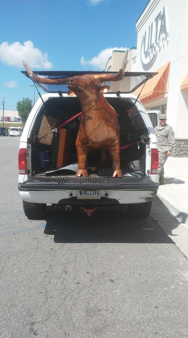 I was out yesterday and saw this guy loading his SUV with this. So cool. It's a grill! Smoke comes out of the horns and nose