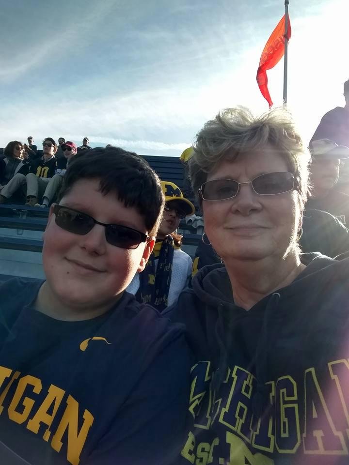 Enjoying this beautiful day with my first born grandson. Go BLUE