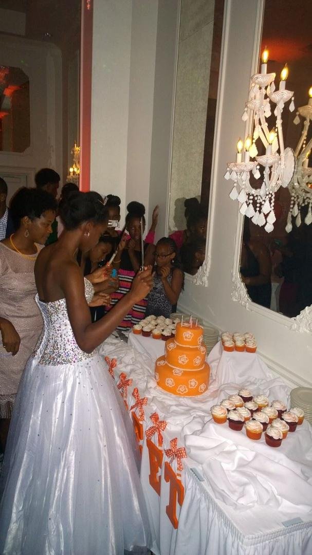 Cutting the cake that mom baked. Delicious cake I might add. :)