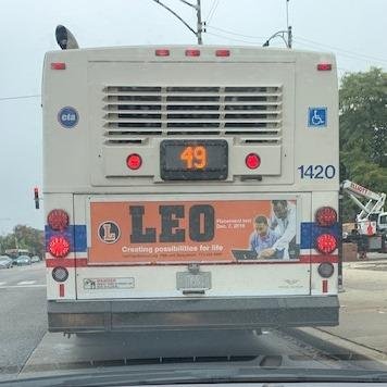 I was in Chicago visiting my daughter and driving by Roberto Clemente High School when I came up to this bus and was surprised to see this advertisement for Leo High School. Hope it works and Leo High School will continue