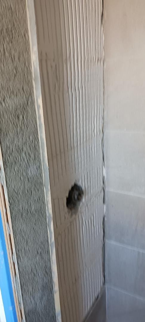 Repairs that Christi Galla had to do. The repairs to the Master Bathroom that needed to be done to install a glass door in the shower