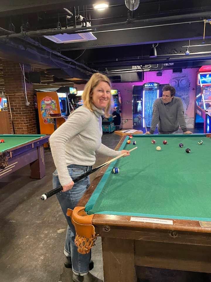 Kathryn teaching us the art of [playing pool
