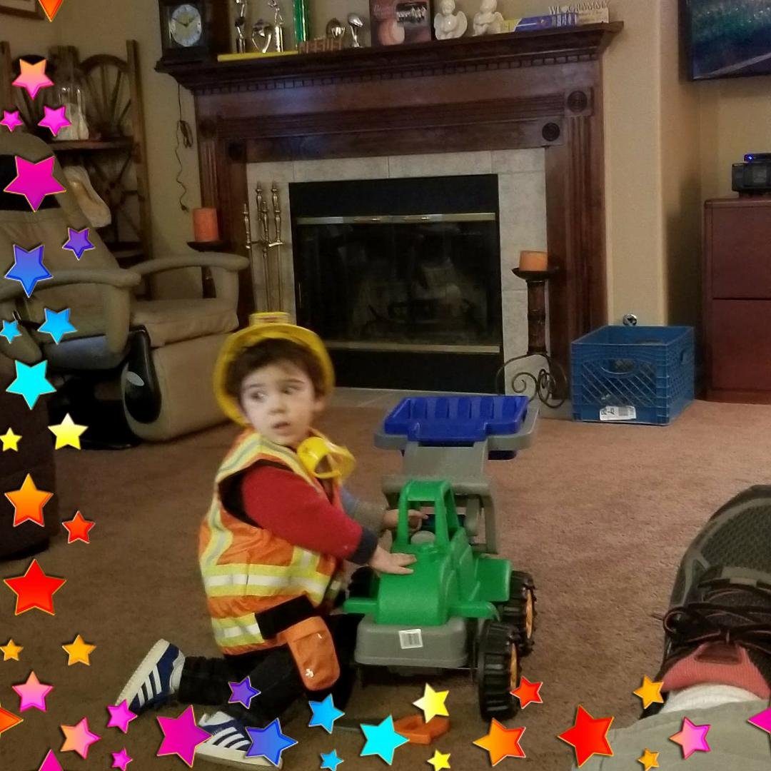Our great grandson "Ace" trying out his new outfit!