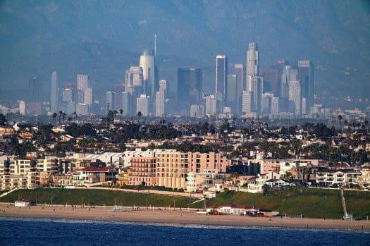Beautiful Redondo Beach CA shot with downtown Los Angeles in the background, on a Smog free day in February 2020.
The backdrop are the mountains that surrounded LA, often seen with the famous "Hollywood" sign.
The downto