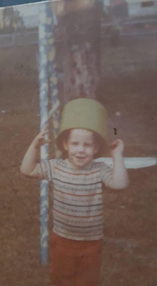 Happy birthday to my 43year old baby boy with that pail on his head how time flies (Brian Earl Bateman
