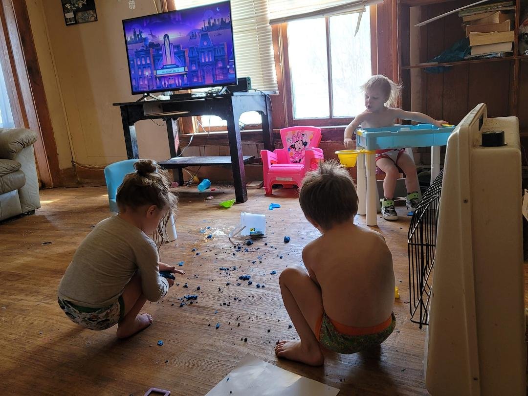 Grandma letting the 3 Littles make a mess and play with slime sand while Daddy is at work..lol. They are having so much fun. It's funny Rowan is the one who keeps going and picking up the play sand on the floor putting it