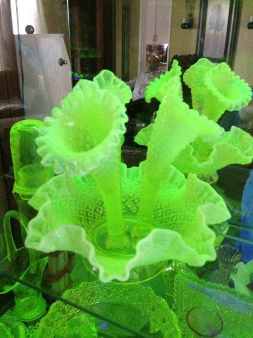 This is a Vaseline glass epergne