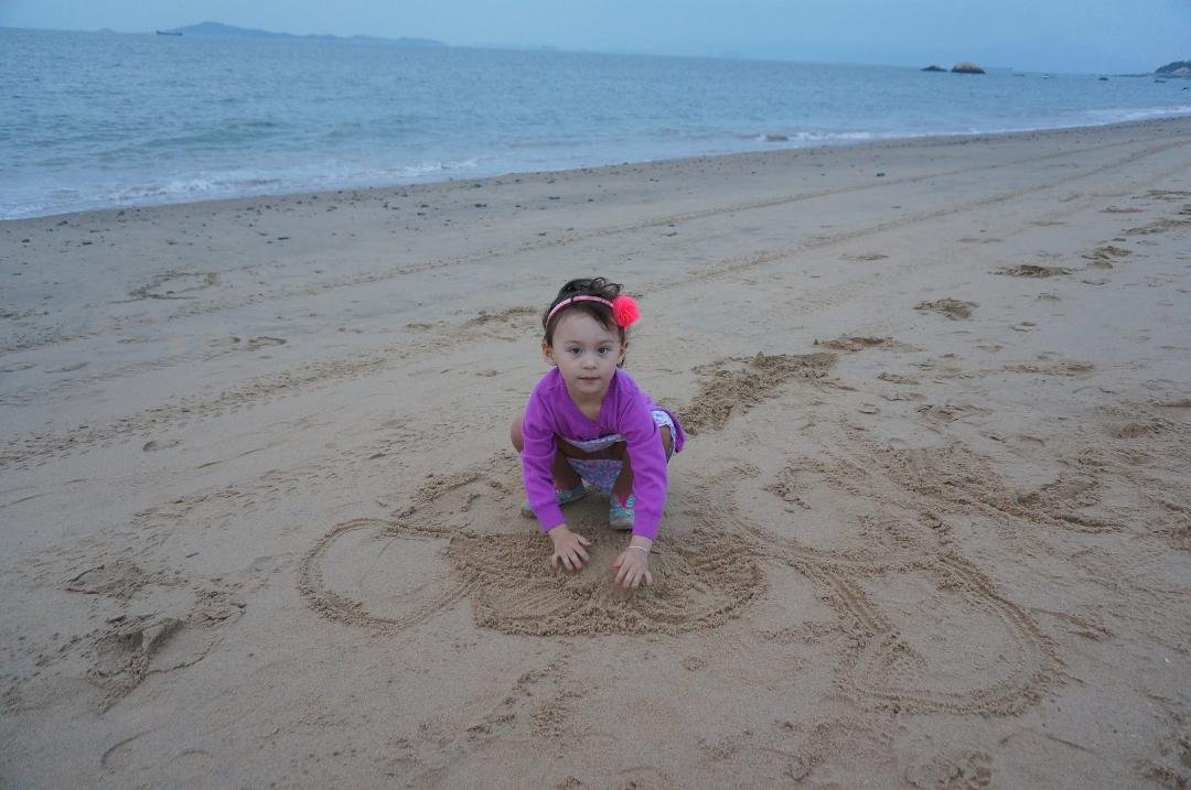 Erin at the beach in Xiamen....we were there on vacation for the month of May 2015. She had a great time!!