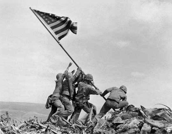 To those that have the right to burn the flag just remember these soldiers raising the flag .
What side ate you on