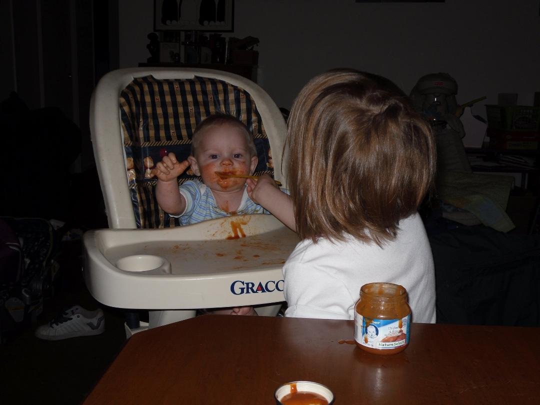 She loves to feed him.