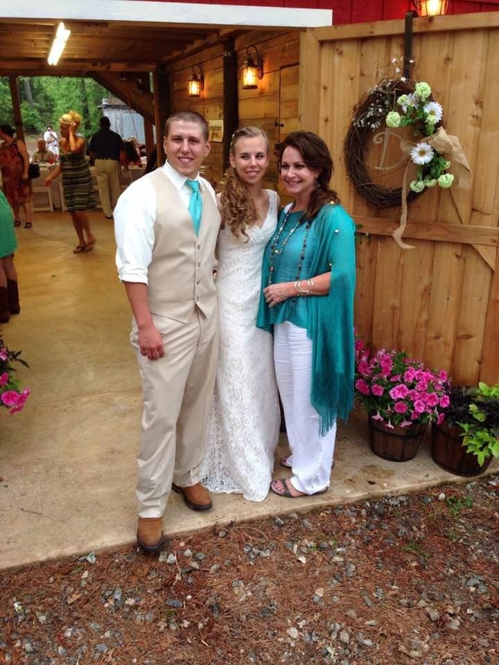 My granddaughter Lauren her Husband Derek and my daughter inlaw Georgia on her wedding day !