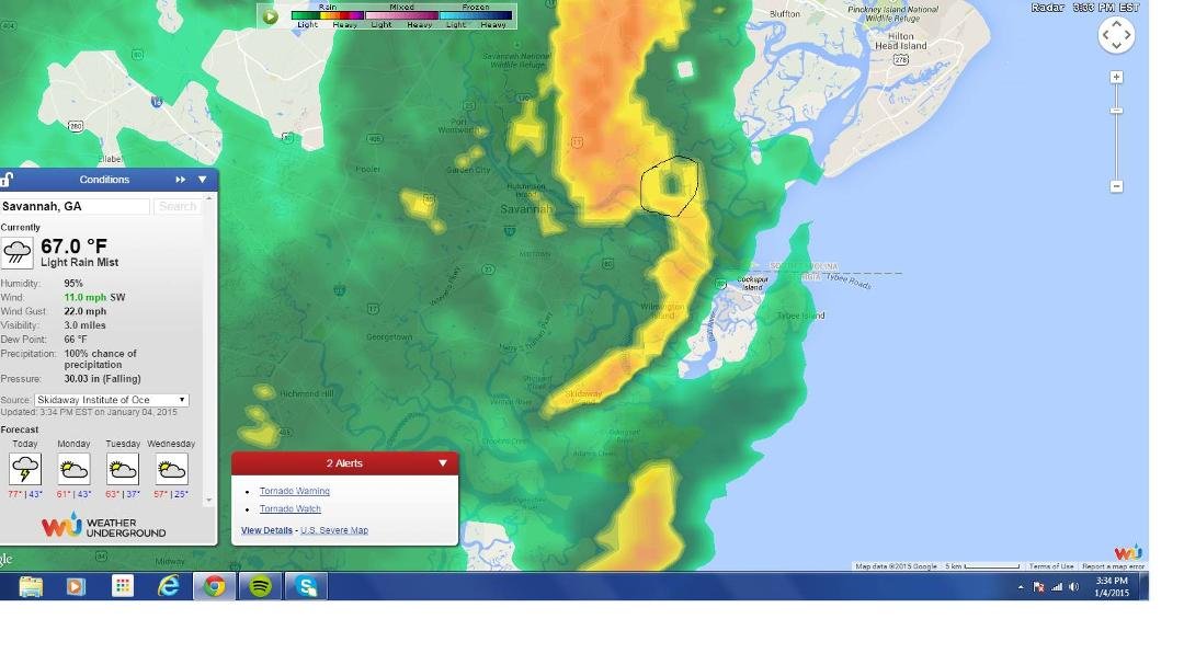 The circled area is the tornado signature a few moments ago. I live southwest of the circulation.