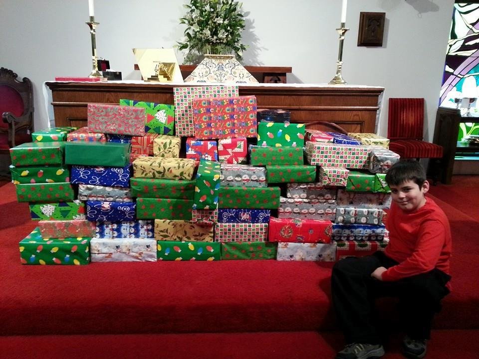 Conner helped the Uppercrust group yesterday filling box's with gifts for the Seafarers that come to port this Christmas season. They all got a special blessing from the Bishop this morning.