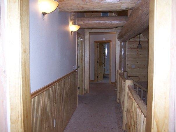Balcony before carpeting, looking east