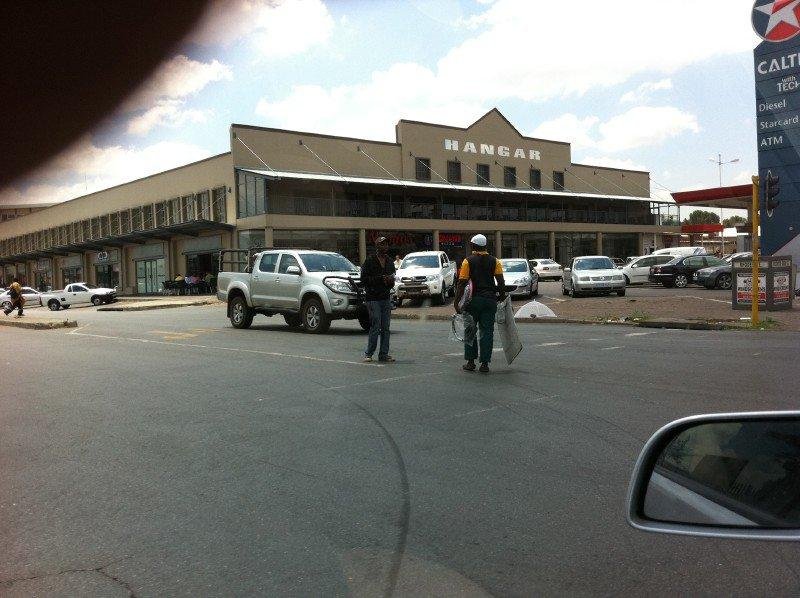 Parking guards - you tip them to watch your car.