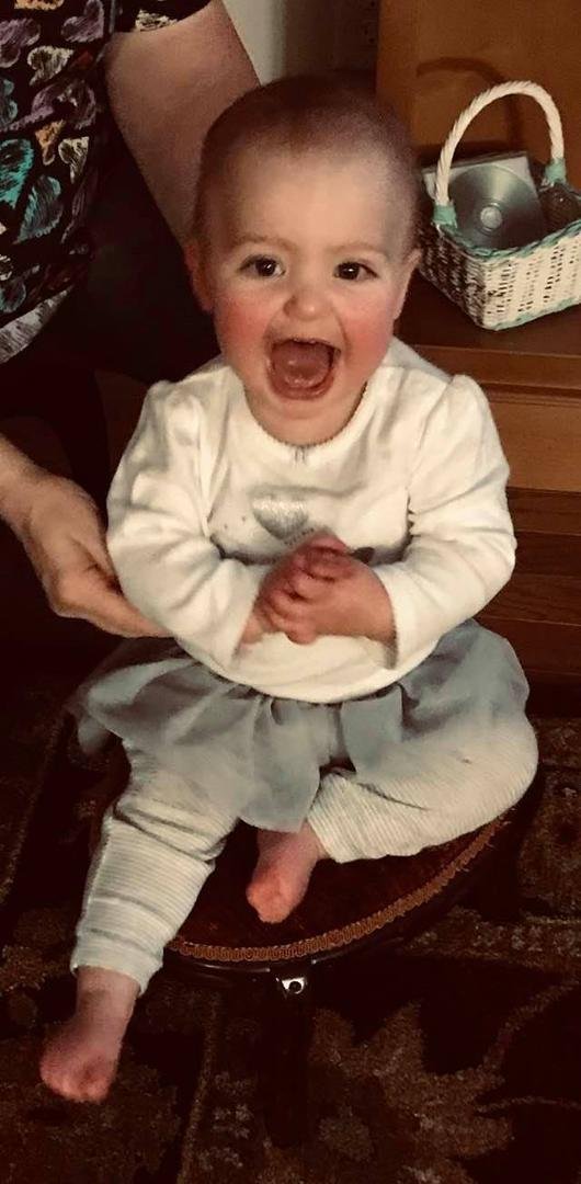 My 1 year old babydoll! Has 5 teeth & crawling everywhere! Cruising the furniture & loves to walk holding fingers! Such a sweetheart!