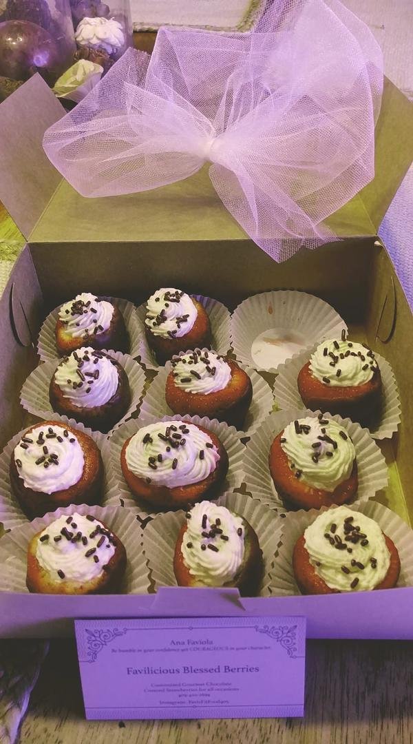 My birthday present from daughter, Keli Sappington. Cream cheese and powdered sugar inside, these are so good!! Yummy!!  Made by a local Lady, Ana her card is in front.