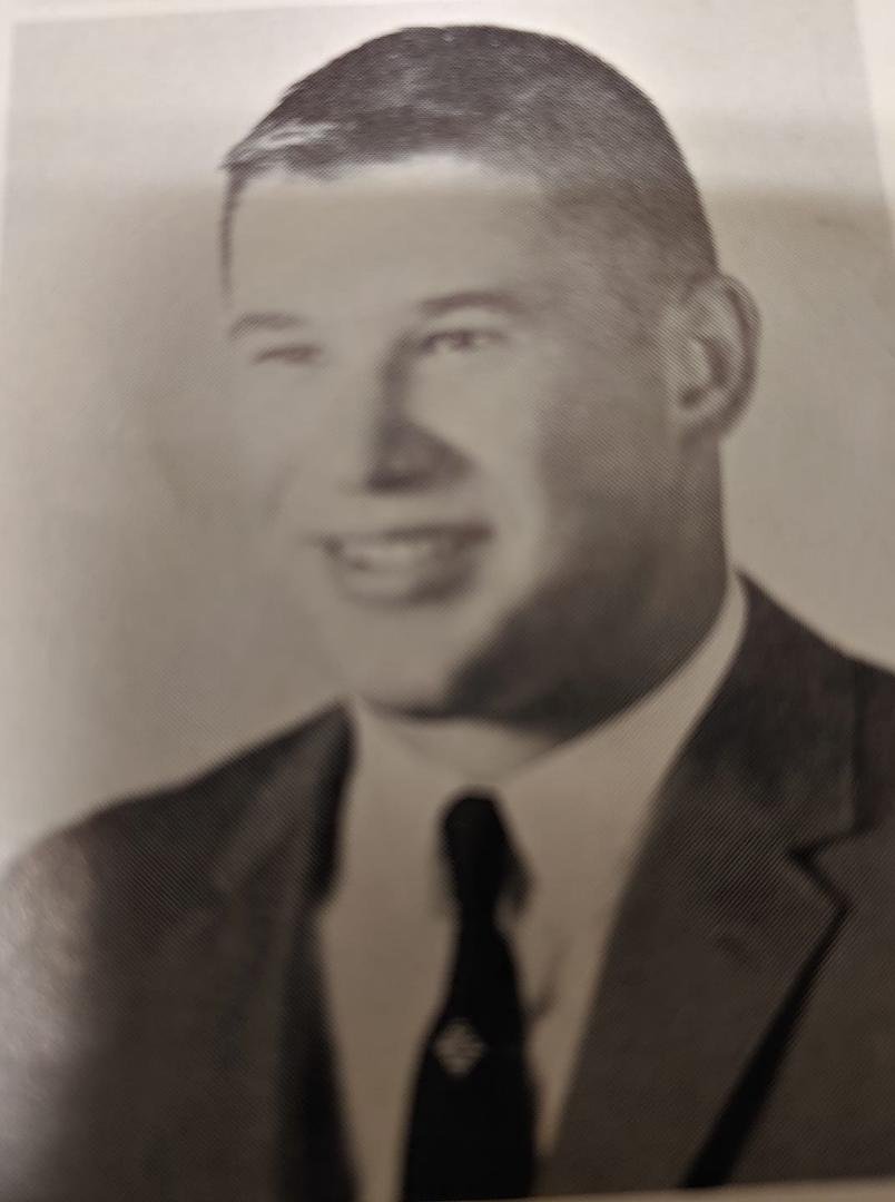 I'll play along. Had to dig out the yearbook. All of Coach Mac's wrestlers had have short hair. Must have borrowed one of my father's ties.