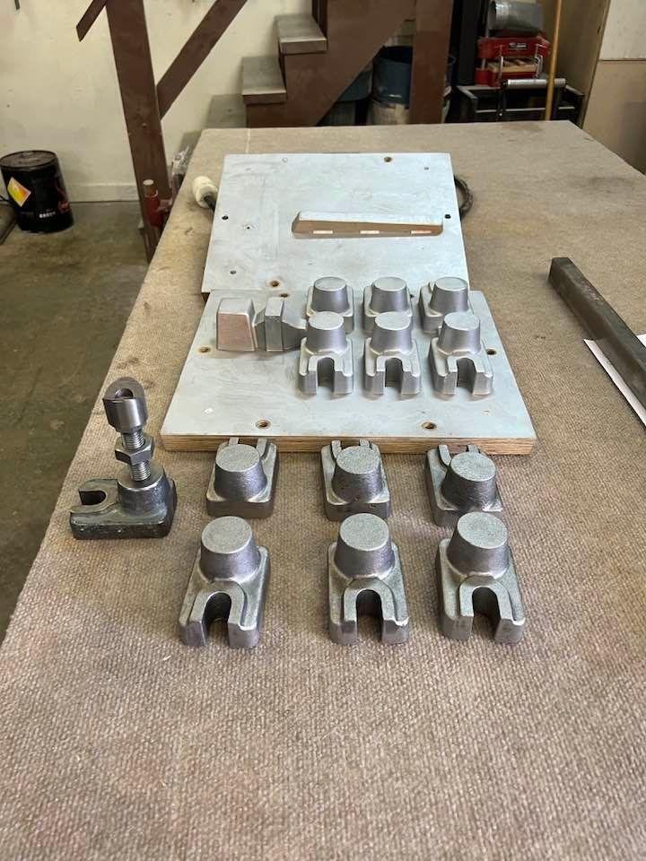 Six castings waiting to be machined to size