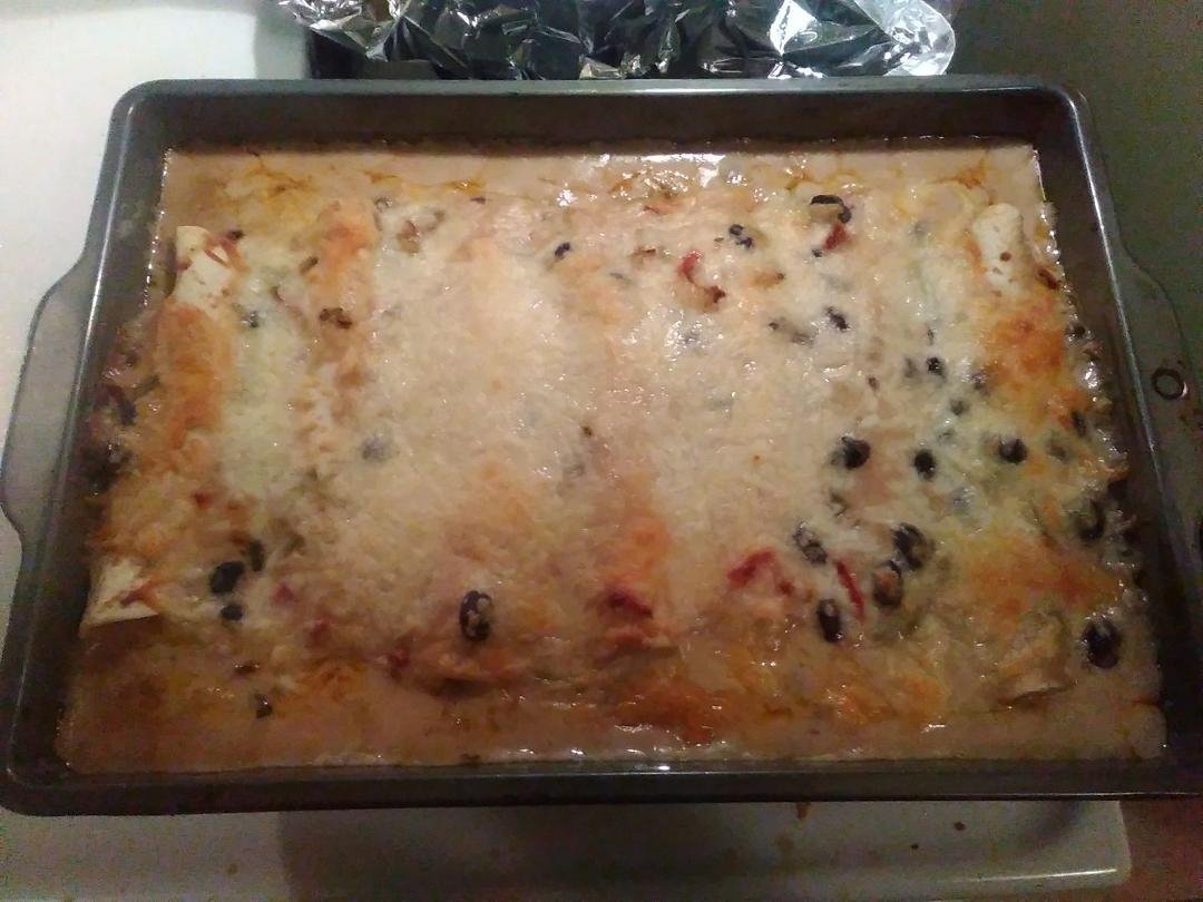 White chicken enchiladas.. S.A. style. It's what's for dinner.