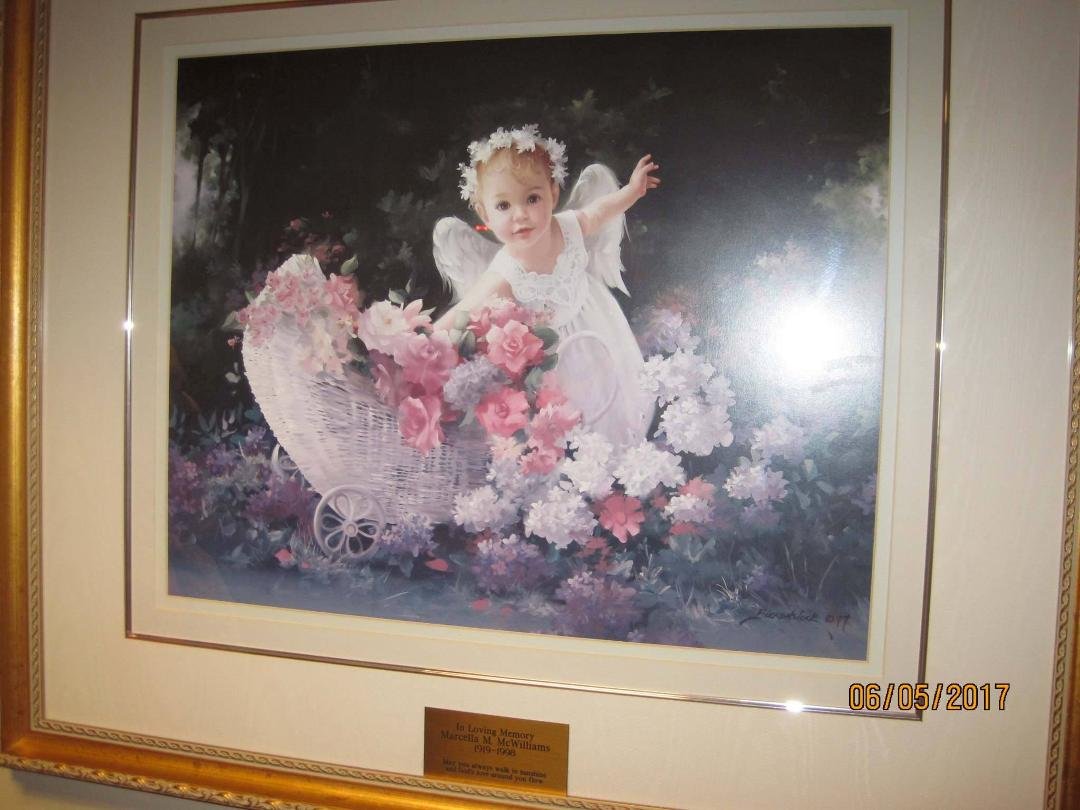 This beautiful little angel hangs in St. Mary's ICU. Julia and Peg had this dedicated in memory of our mother when she left us in 1997.