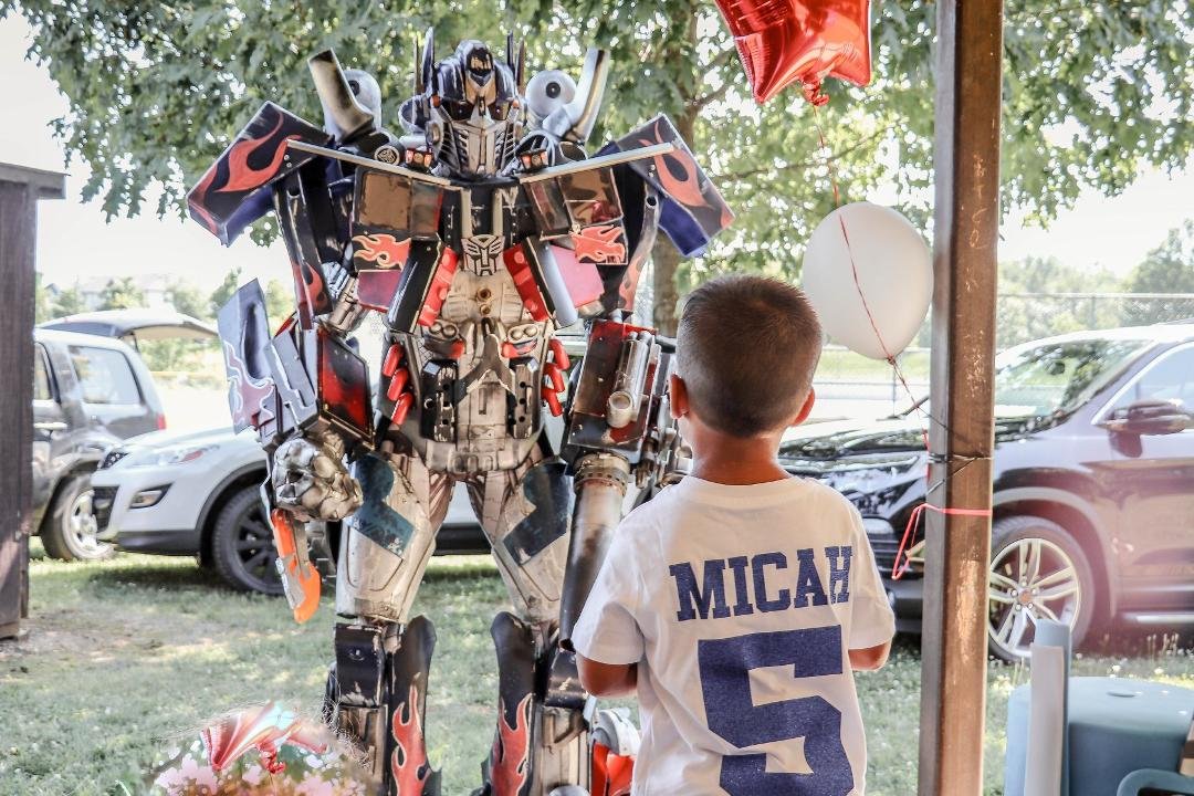 After helping to sing Happy Birthday it was time for Optimus Prime to leave and Micah said a sad good bye