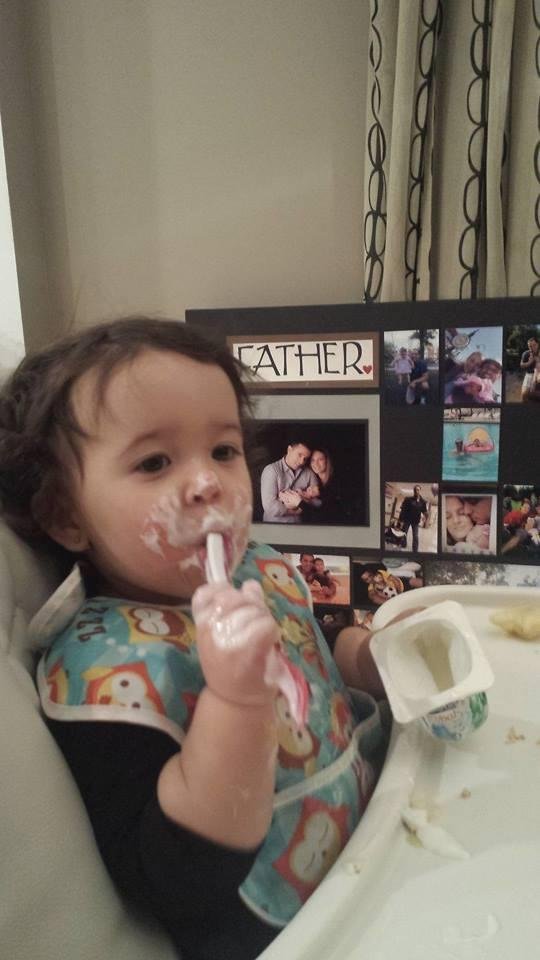 Feeding myself!!! Daddy's watching me!!!!