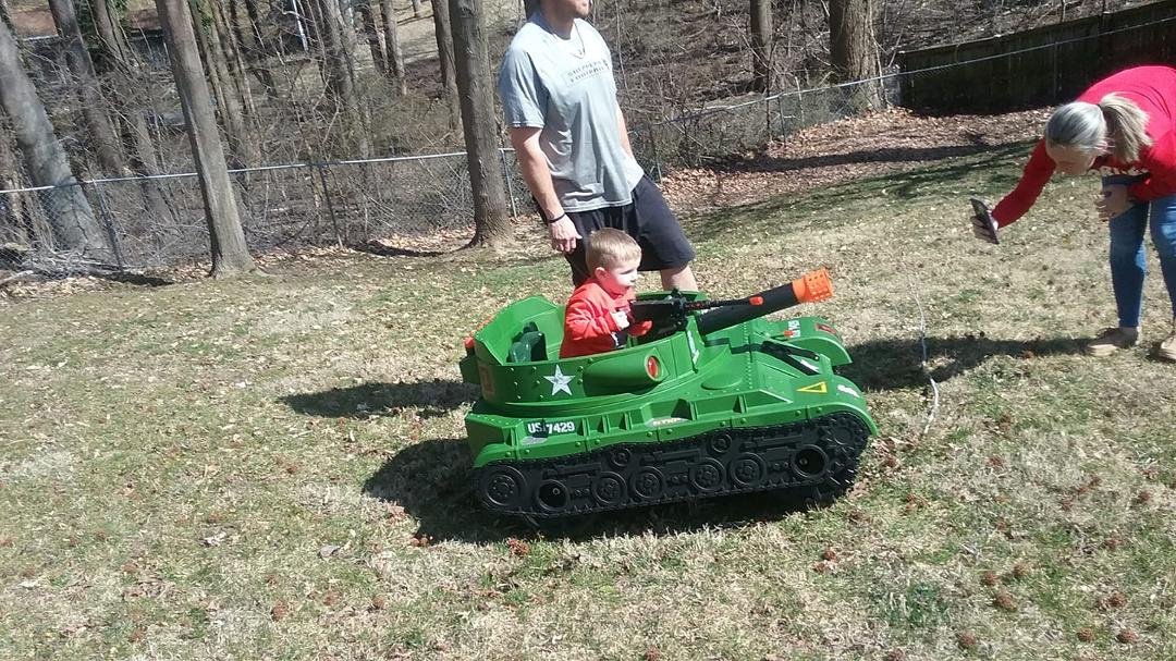 For all of my liberal gun hating  friends....
My 3 yr old Grandson with his birthday Tank.....