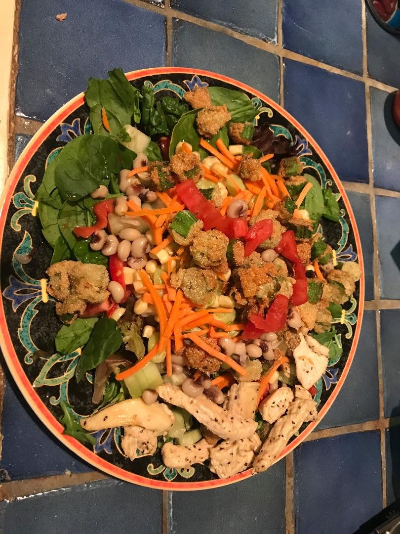 Was in the mood for Soul Salad.....corn, limas, black-eyed peas,carrots, tomatoes, cucumber,fried okra on top, chicken, spinach, other greens.