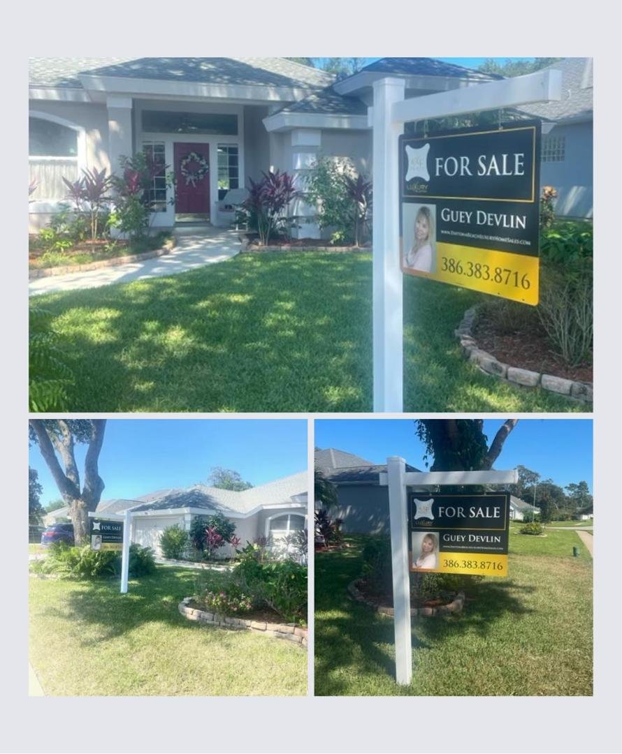 Mom has her new signs up on her listings.