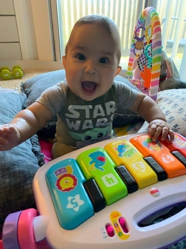 Start em young. She loooovvves music. Just like her paw paw.