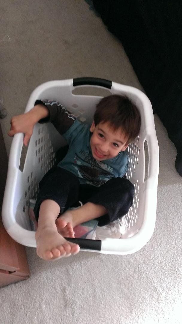 Laundry day at my daughter's house with grandson Adam, who recently turned 4 years old.