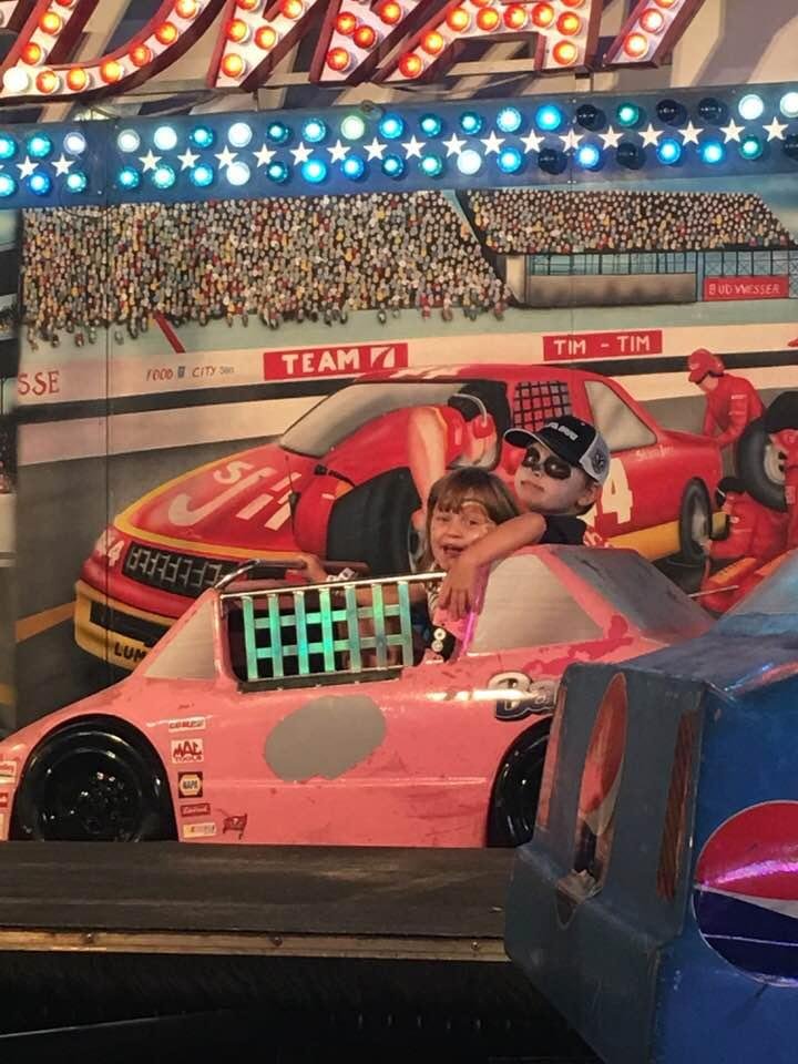 Michael taking one for the team in the Barbie Car with little sis. 😋
