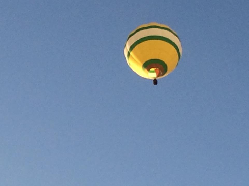 So I'm going to the salon this morning and look up in the sky to see a big yellow hot balloon in the sky. I tell a guy at the WaWa and he says I'm full of hot air. Here's my proof. Lol. Have a great Saturday. Please no comm