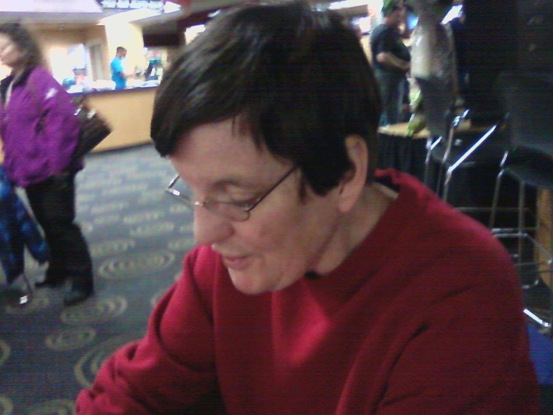 This is Mary Haffey figuring out her Bingo board at bowling...one more number...