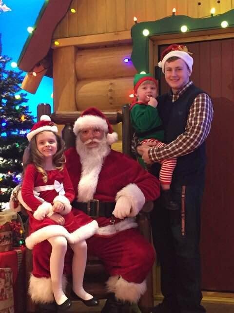 At bass pro shop with Santa Claus OK
