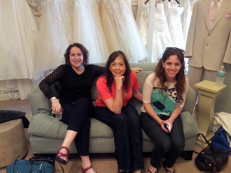 Watching Julia Gordon try wedding dresses with R Julie K Gordon, shoshana Gordon, and Ilana Abby Gordon