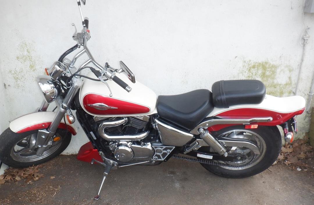 Took this pic of my Suzuki Marauder VZ 800 a couple months ago after swapping out the small round stock mirrors for rectangular ones that stick out a little further. The only thing I could see in the stock mirrors were my s