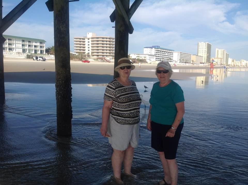 "Under the Boardwalk" at Daytona Shores . Marg and Andrea.