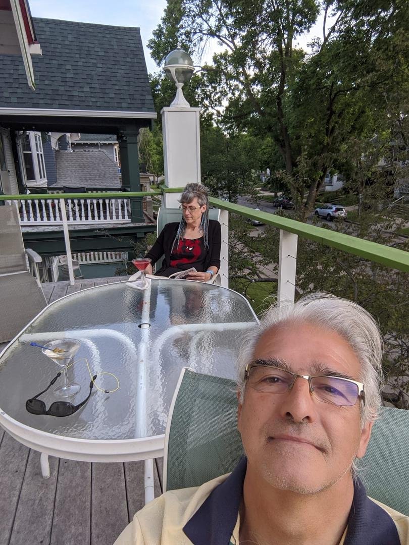 Happy equinox, Juliei & I on the balcony after a long day of working around the house. Note the martinis, Cocomo by Beach Boys on speakers. Gotta love WI summers.