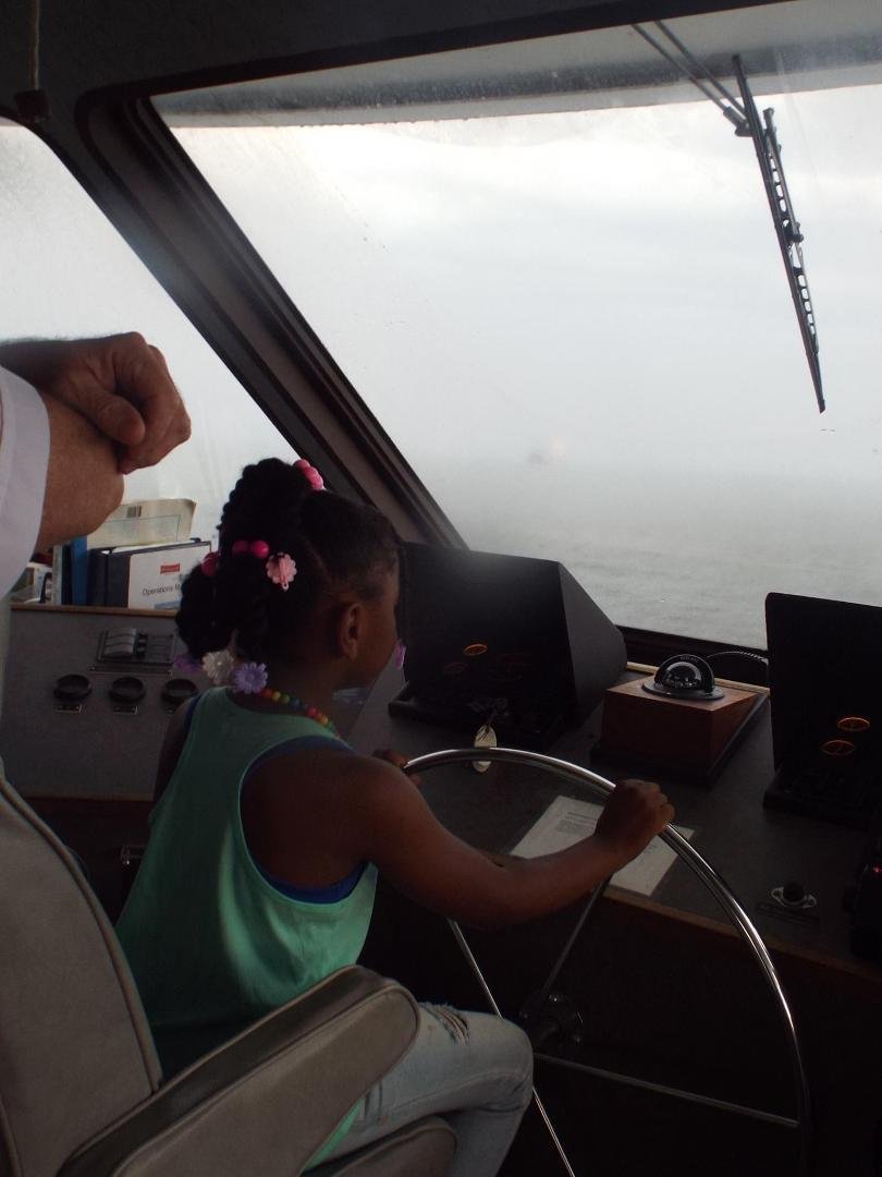 My Great Niece Chelsea took over the Captain's Job on our 4th of July Cruise.