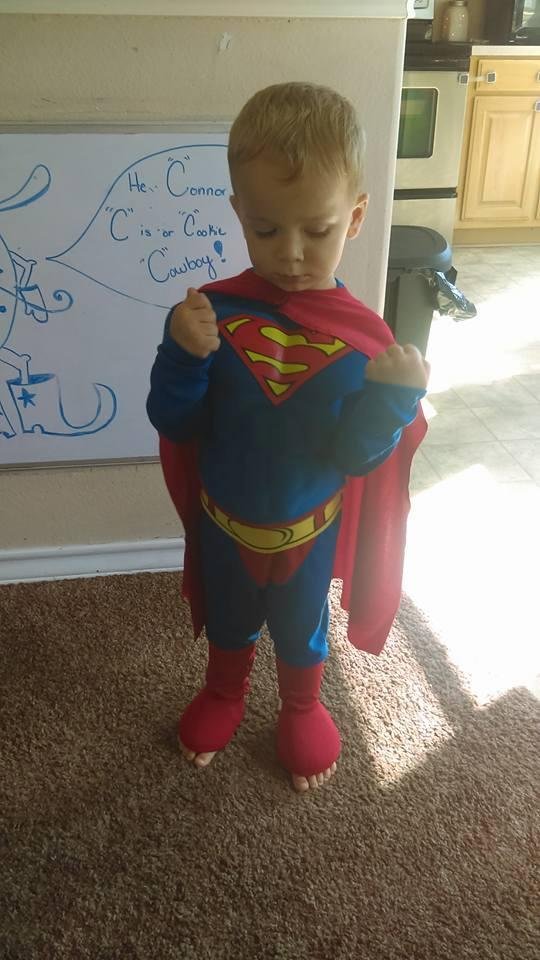 Superman flexes his superhero muscles....impressive!!!