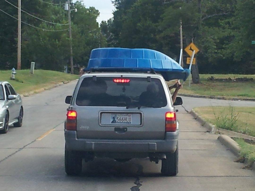 Followed this down the road...holding it on by hand?!