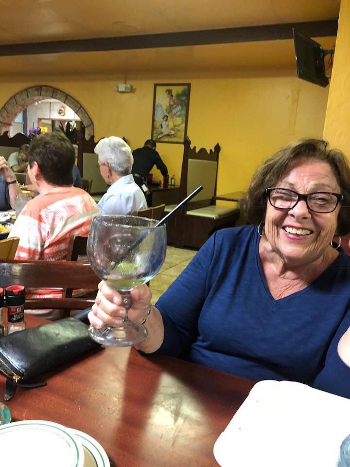 Another margarita for Rosemarie-empties the glass!